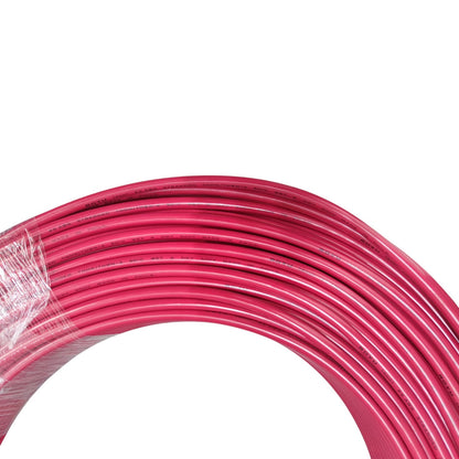 Coiled pink cable on a white background