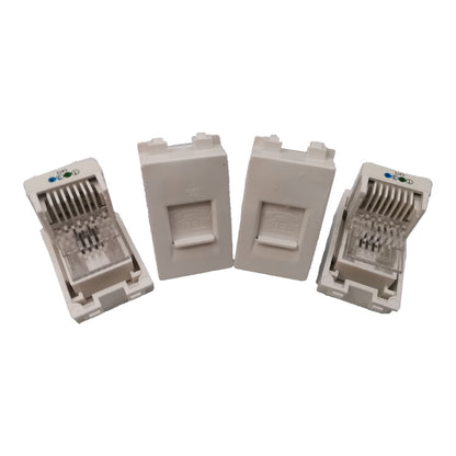 Four RJ45 network module connectors in white plastic, including two closed modules and two open modules showing the internal gold-plated contacts and clear cable tray, set against a plain white background.