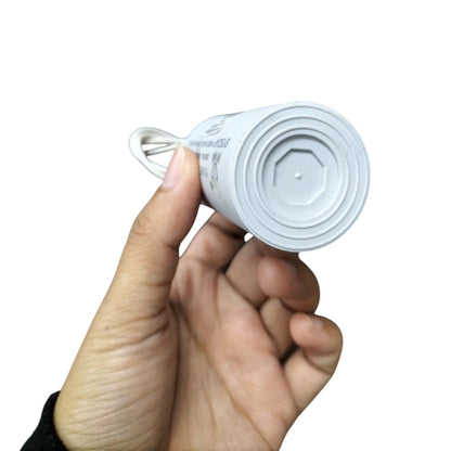 Syscap 15MFD motor running capacitor held in hand for easy installation and operation