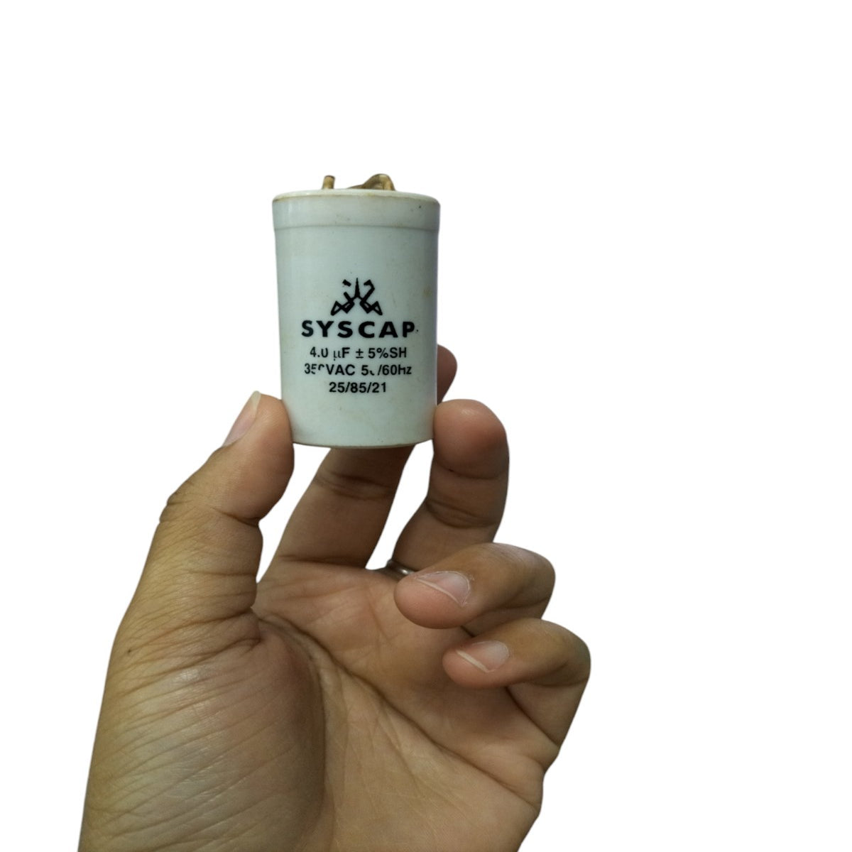 4MFD Motor Running Capacitor by Syscap held in hand for electrical circuitry use