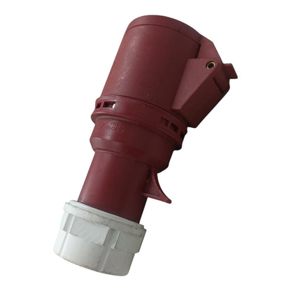 Red and white plastic fitting on a white background