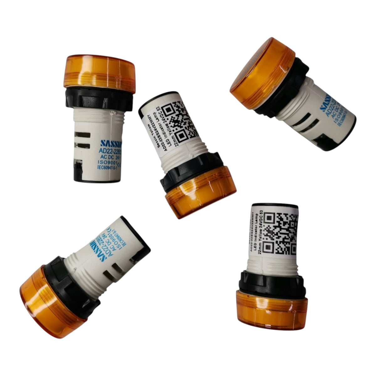 Four small cylindrical amber and white plastic components with black bands and printed text/QR codes, arranged on a plain white background.