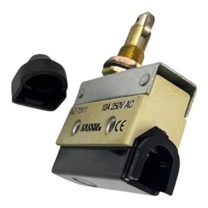A small electrical rotary switch with a brass-colored post, a beige metal faceplate, black plastic housing, and a separate black cap shown beside it on a white background.