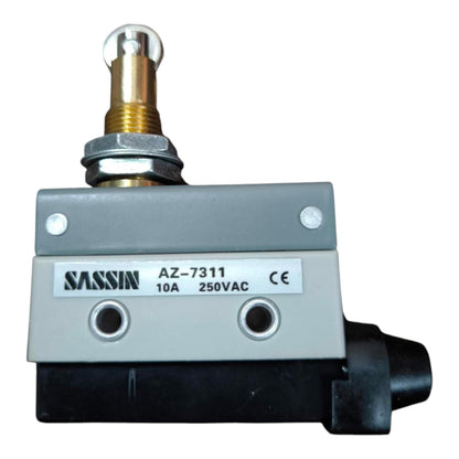 A SASSIN AZ-7311 electromagnetic valve solenoid, featuring a gray metal body, a black plastic base, a brass screw post with a glass bulb, and a black connector, shown on a white background.