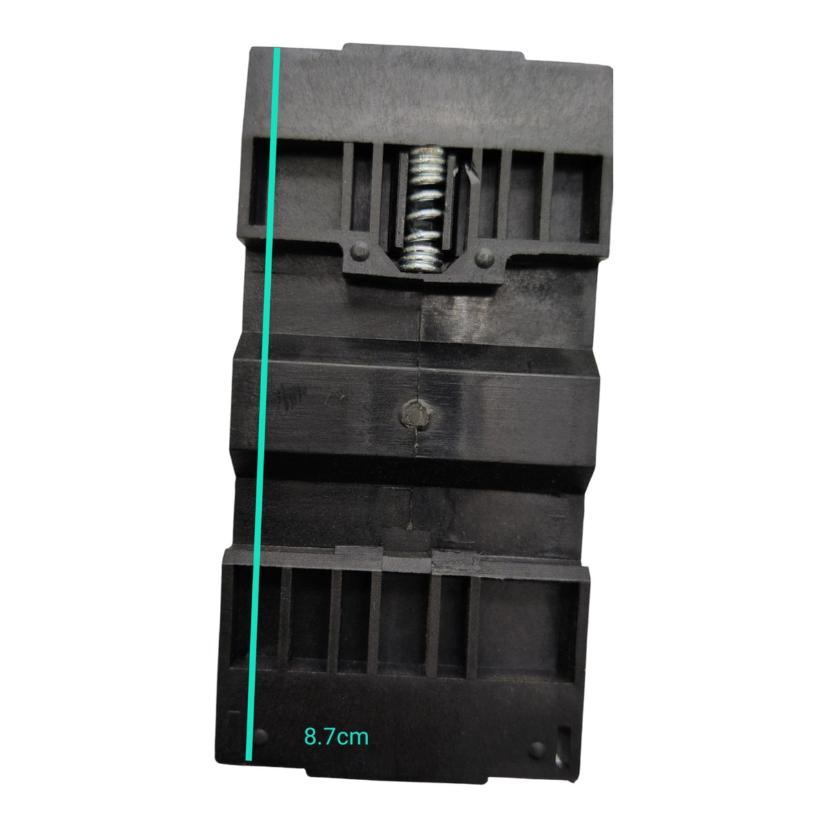 Black mechanical component with a spring and measurement label on a white background