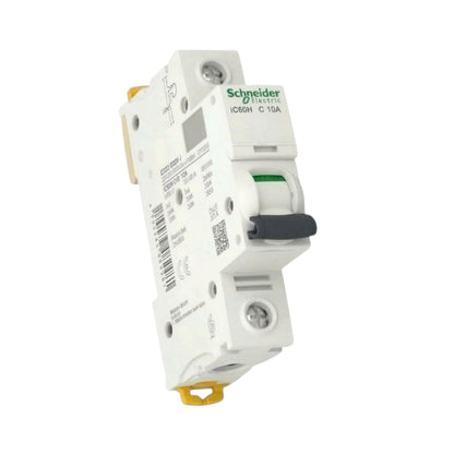Schneider Electric ICD65H C10A modular circuit breaker with a white plastic housing, black switch handle, and yellow terminal connectors, shown on a plain white background.