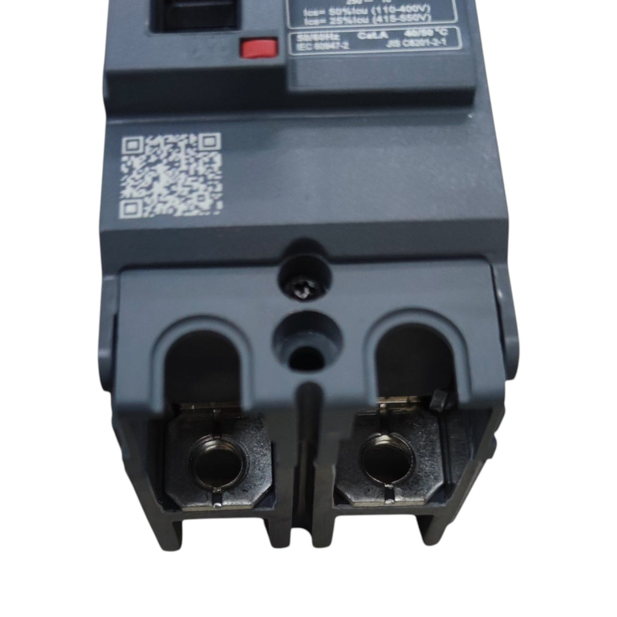 A close-up of a dark gray electrical circuit breaker component with terminal connectors, a QR code, and printed technical specifications on a white background.