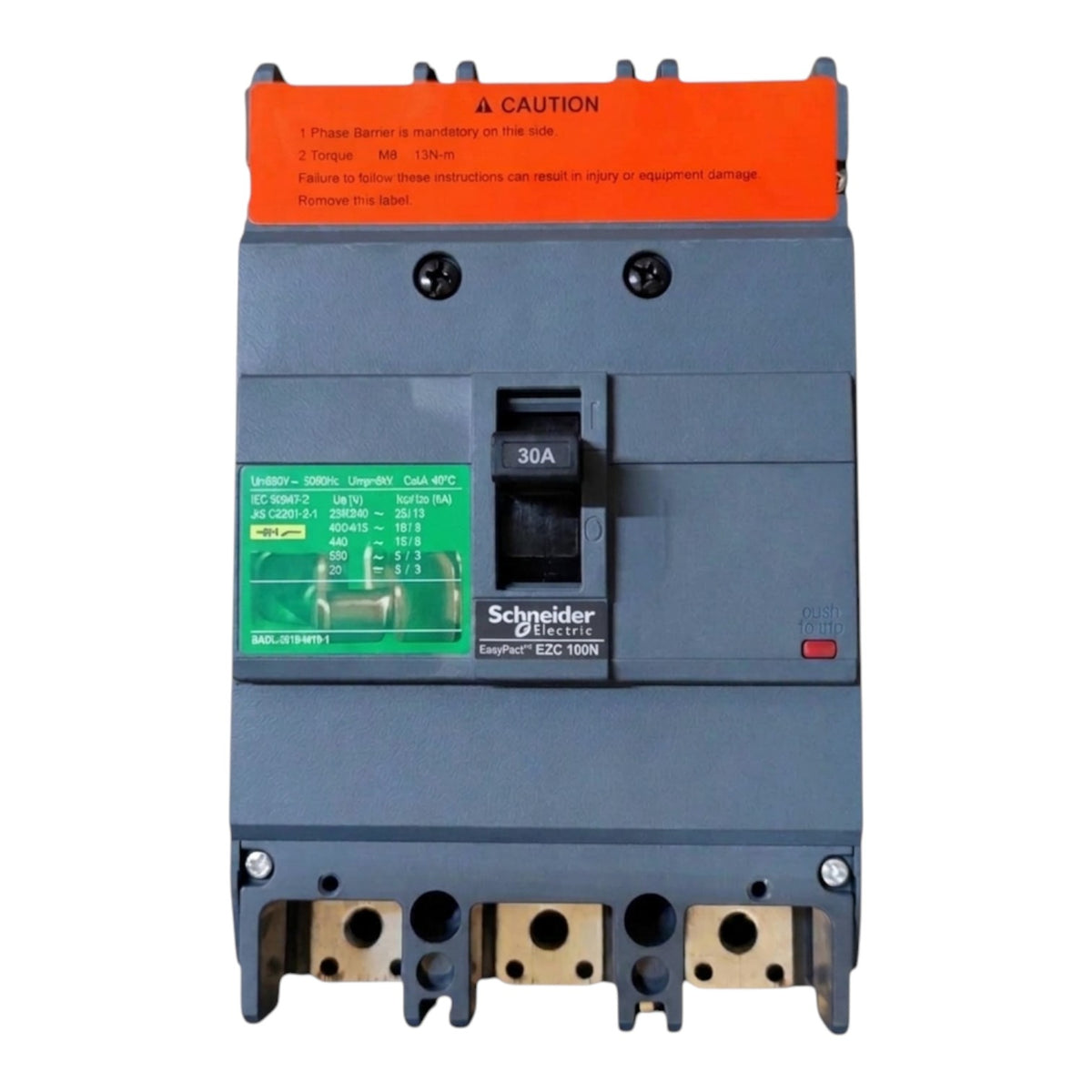 Schneider Electric ESD 100N circuit breaker with a gray plastic body, orange top protective cover, green technical specification label, and terminal blocks at the bottom, shown on a white background.