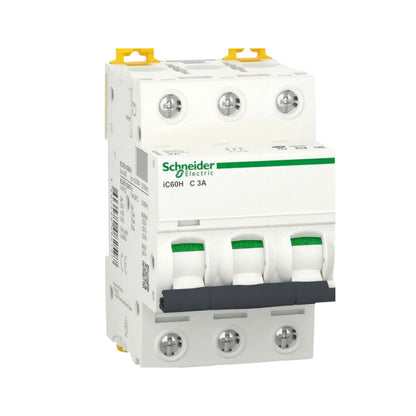 Schneider Electric IC60H C 3A modular circuit breaker module, white plastic with green accents, yellow top handles, and a dark gray front latch, shown on a plain white background.