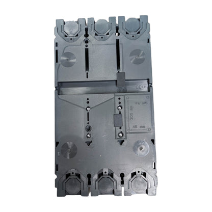 A gray plastic modular electrical component or terminal block, photographed from the front against a plain white background.