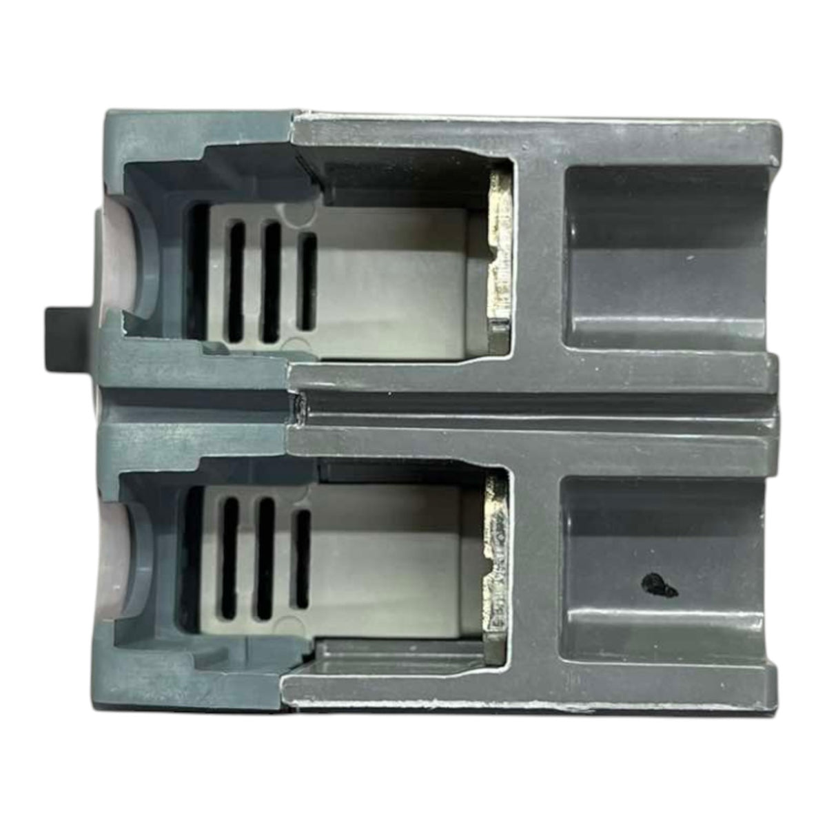 A gray plastic replacement part, likely a filter cartridge or housing component, shown from a top-down perspective on a white background.