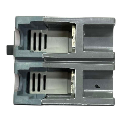 A gray plastic replacement part, likely a filter cartridge or housing component, shown from a top-down perspective on a white background.