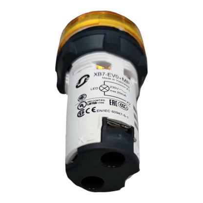 A small cylindrical electronic component with a translucent amber top, black top and bottom sections, and a white middle body printed with technical specifications and certification logos.
