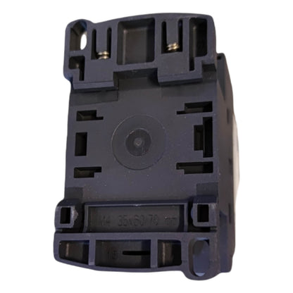 Black mechanical component on a white background