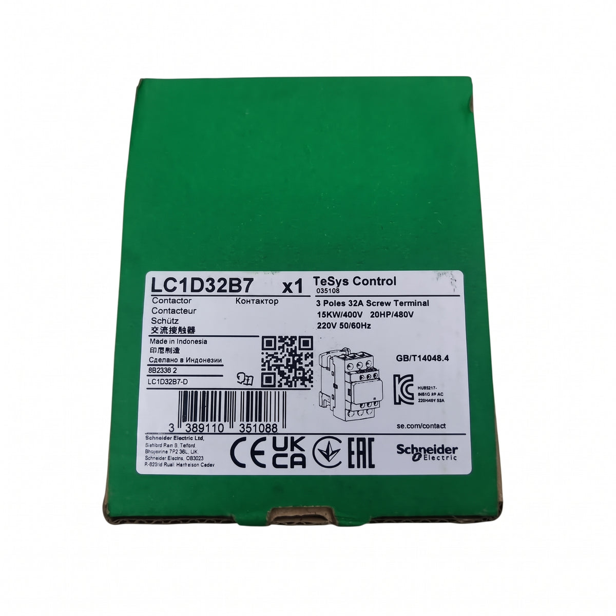 A green Schneider Electric TeSys control box for part LC1D32B7, showing a white product label with barcodes, certifications, and technical specifications.