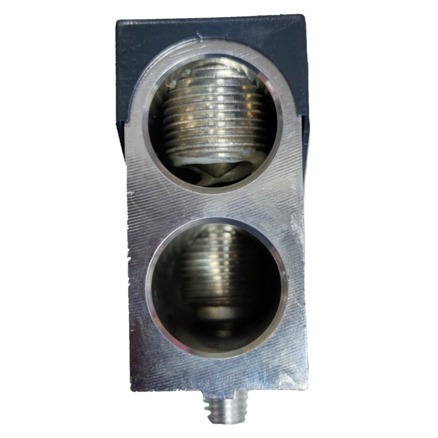 Metallic component with threaded holes on a white background