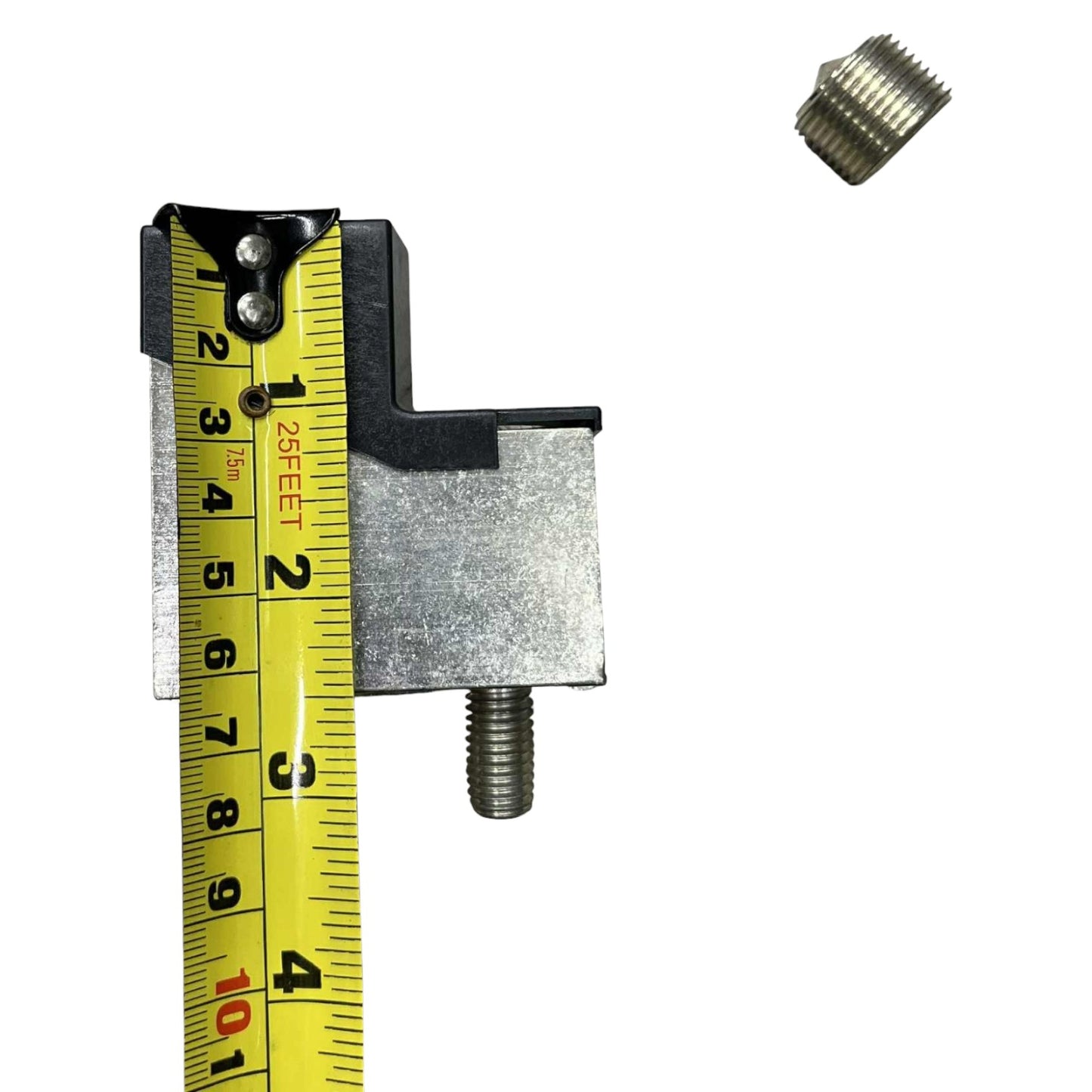 Metal tool with yellow tape measure and small metal component on white background
