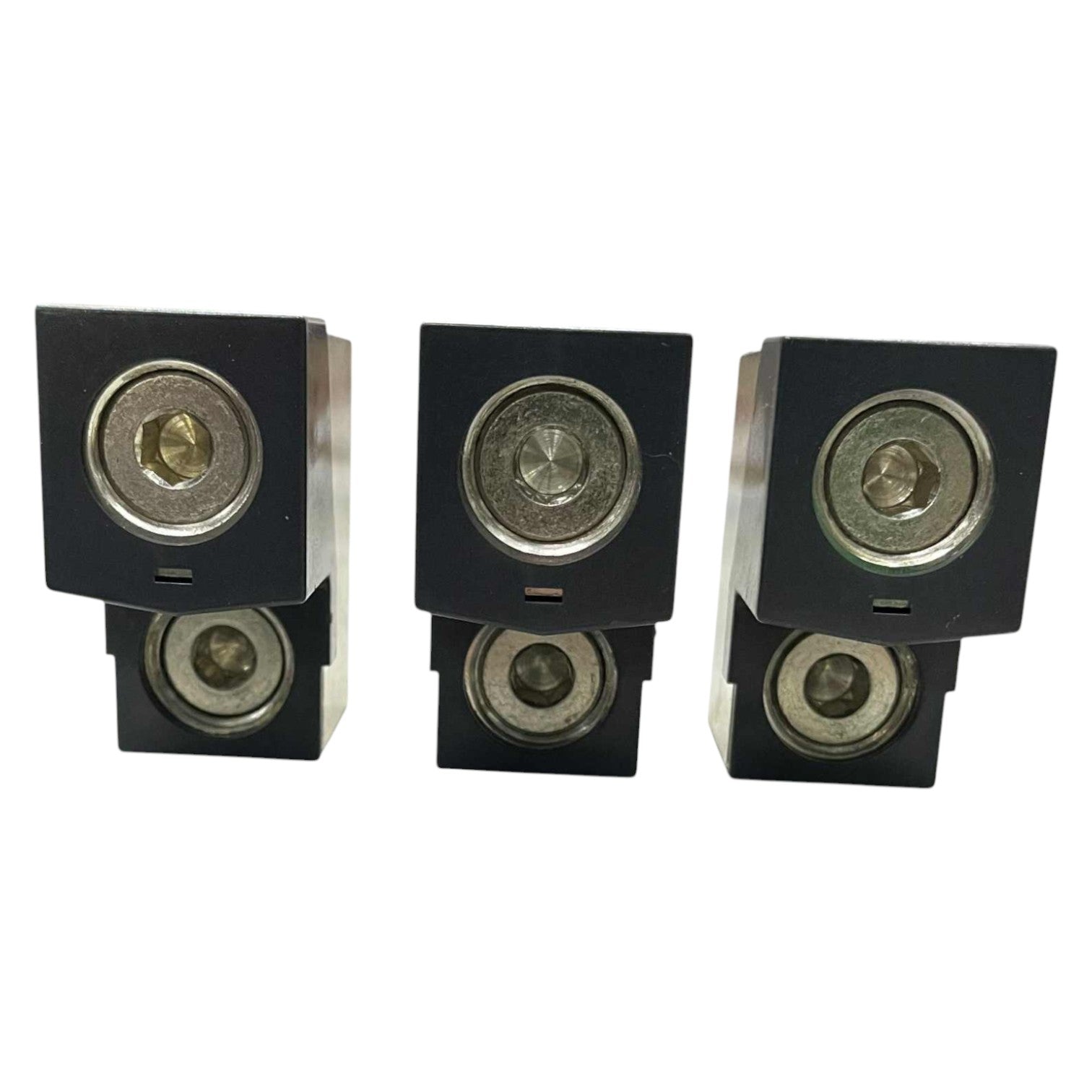 Set of four black speakers on a white background