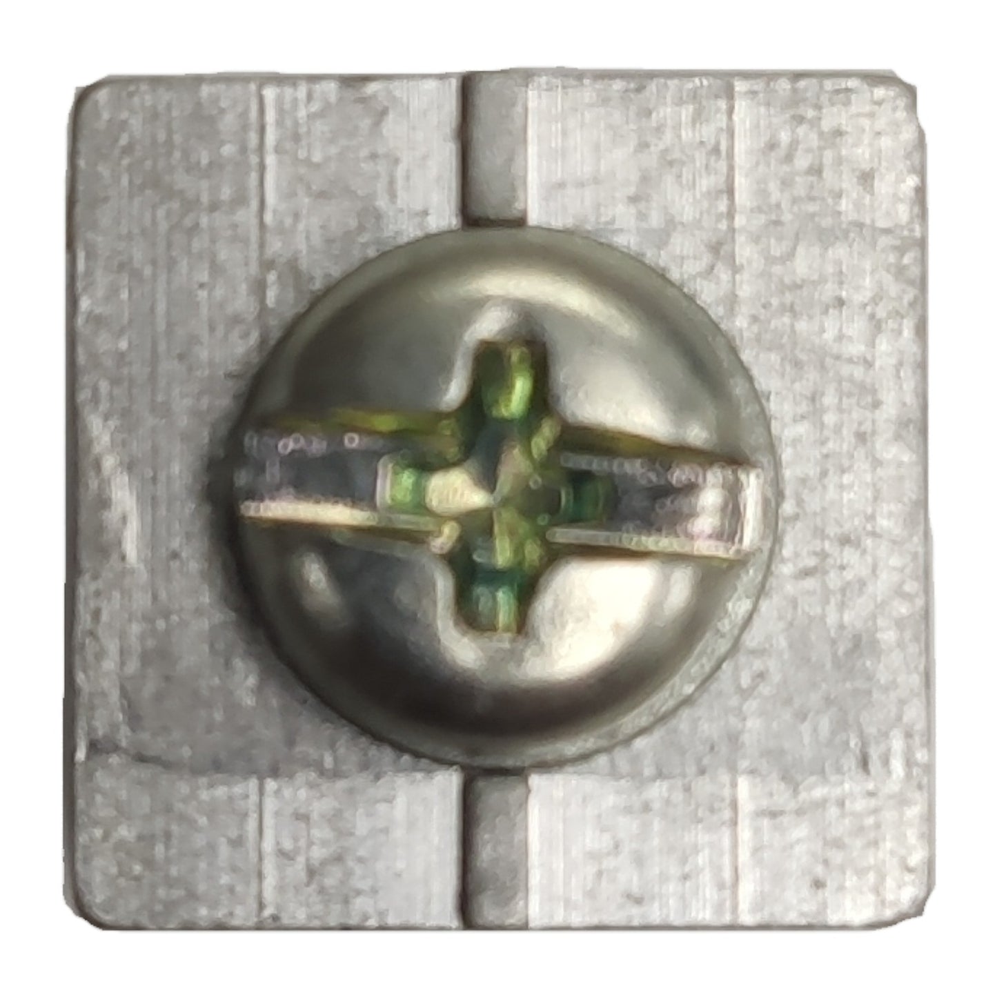 Metal screw with a star-shaped head on a textured metal background