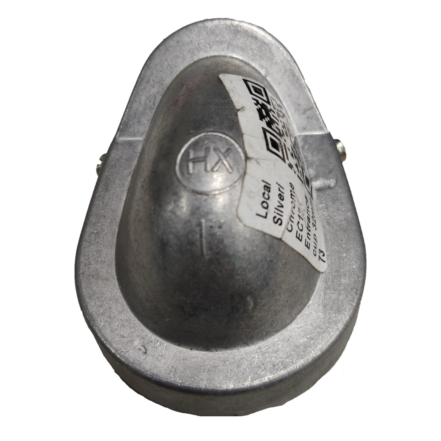 Metallic object with a label on a white background