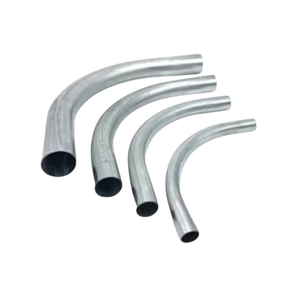 Four curved metal pipes in different sizes, arranged diagonally on a plain white background.