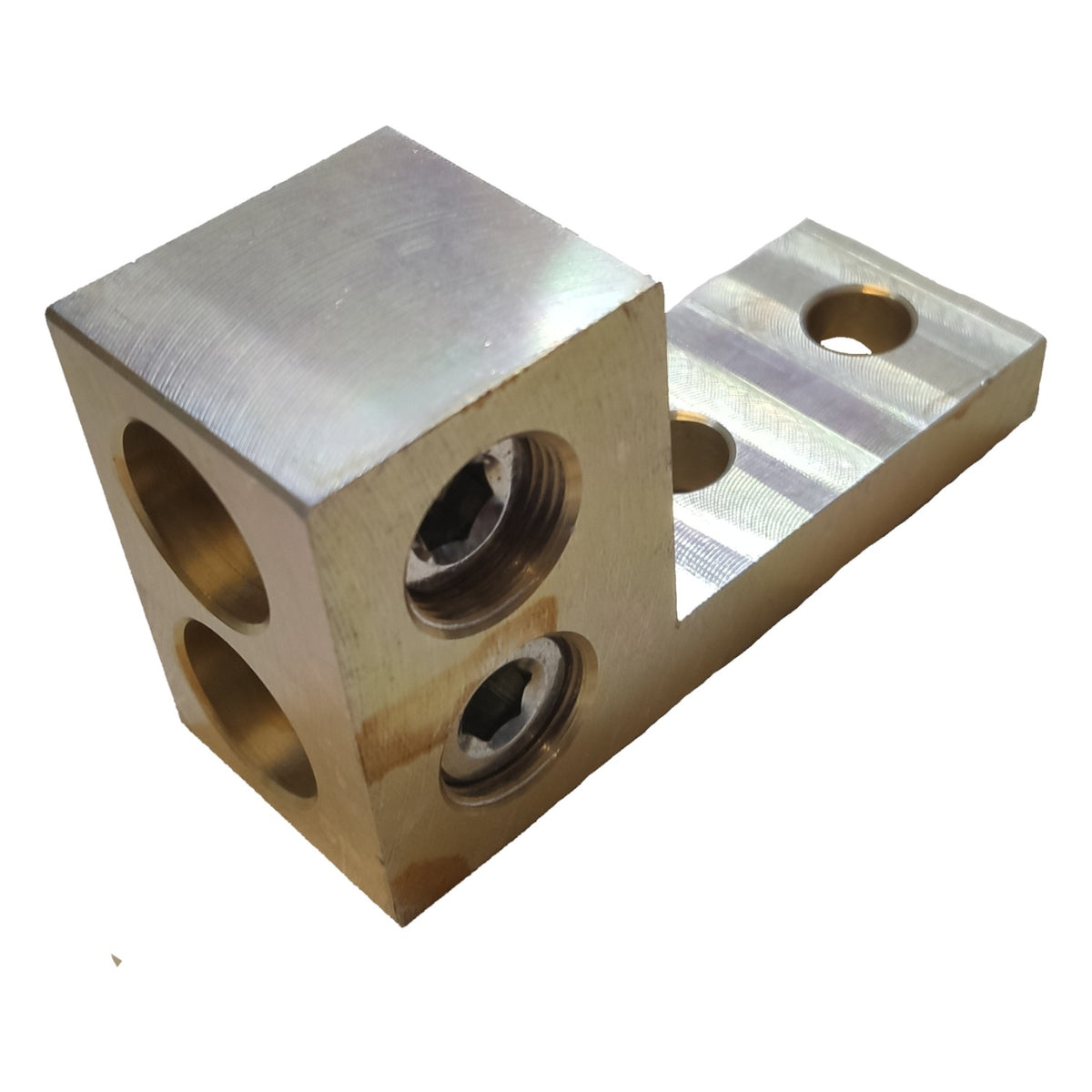 Metal block with multiple holes on a white background