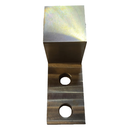 Metal block with two holes on a white background