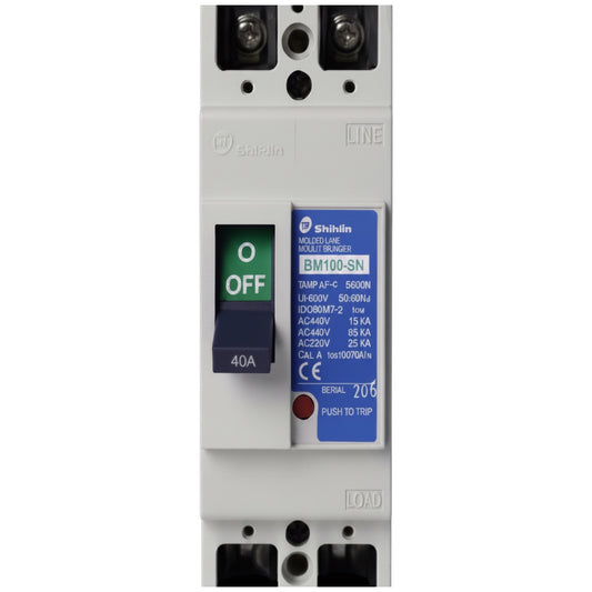 A Shibin BM100-SN modular electrical circuit breaker module, featuring a white plastic housing with a green and blue toggle switch and technical specifications printed on a blue label.