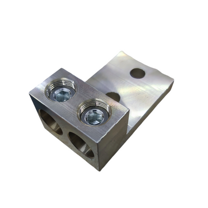 Metal component with threaded holes on a white background