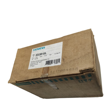 A Siemens branded brown cardboard box with a white product label showing part number ED23B100L, photographed on a plain white background.