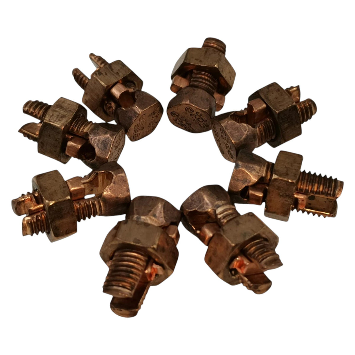 Collection of bronze nozzles on a white background