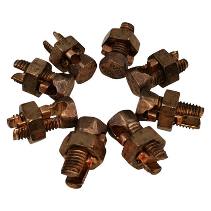 Collection of bronze nozzles on a white background