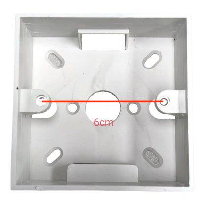 A square white plastic or metal mounting bracket with pre-drilled holes, featuring a red horizontal measurement line and red text reading '6cm' across the center, on a plain white background.