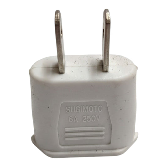 A white plastic 6A 250V Sugimoto wall plug adapter with two metal pins, shown against a plain white background.