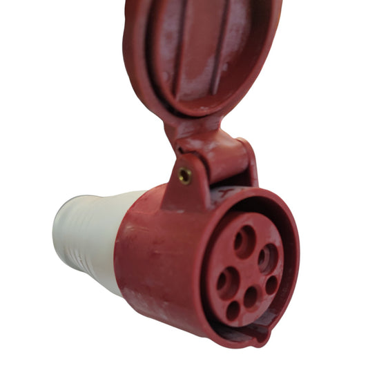 A red plastic multi-pin electrical plug socket with a white connector body and an open hinged protective cover, shown on a plain white background.