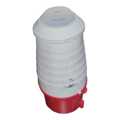 A plastic poultry waterer or feeder container with a white body, red base, and translucent top cap, shown on a plain white background.