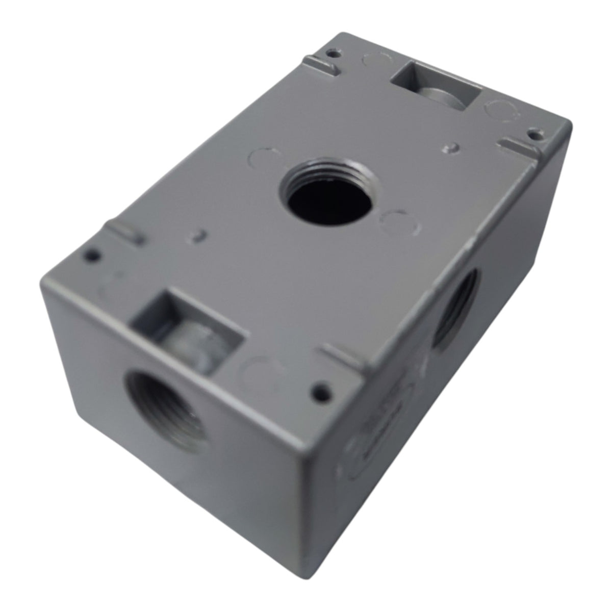 A gray metal industrial component or connector block with threaded ports and molded mounting slots, shown on a plain white background.