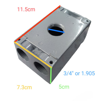 A metal plumbing fitting or valve body shown on a white background with overlaid dimension labels in centimeters and inches: 11.5 cm, 7.