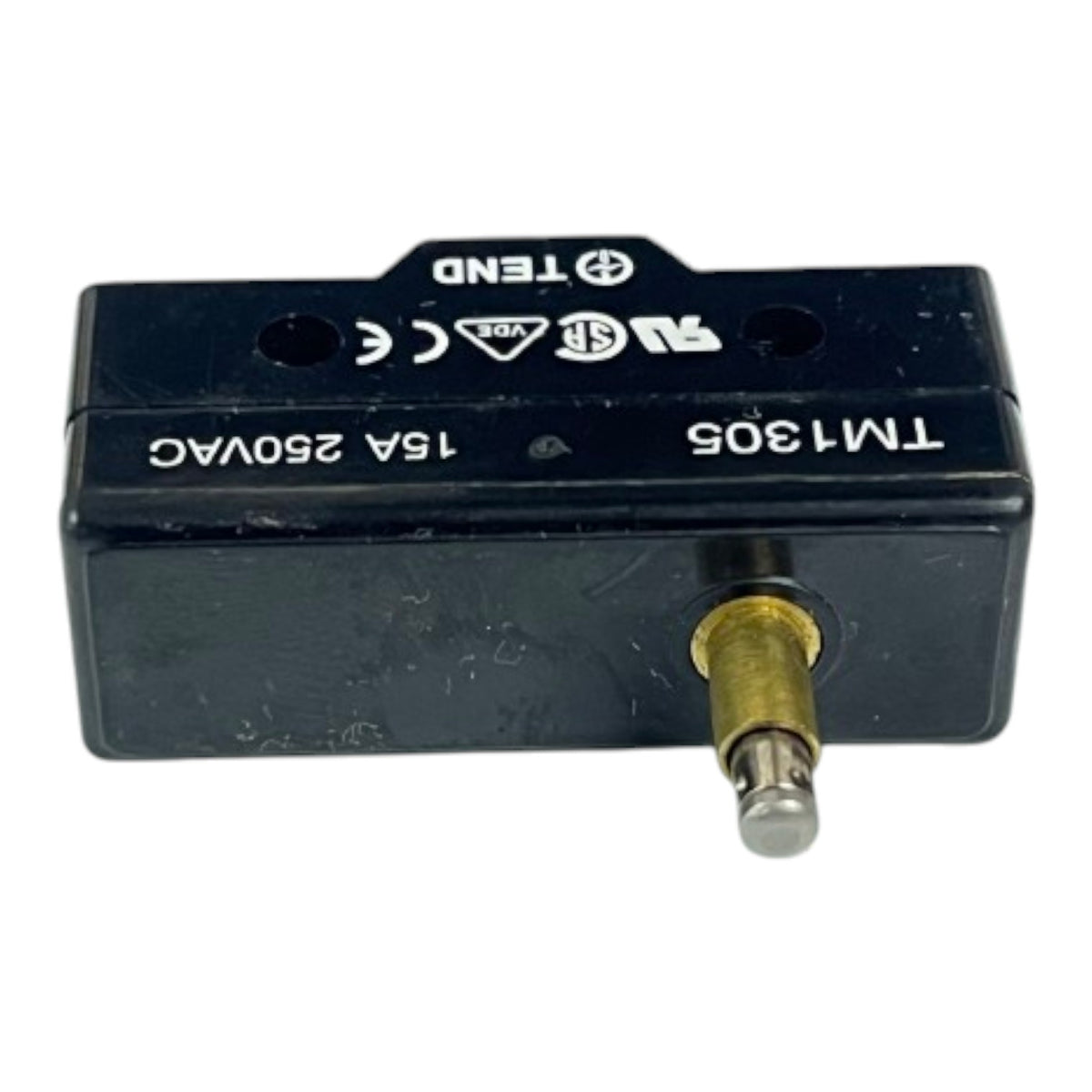 A black electrical contactor or relay component with a brass and silver terminal, labeled with 'TEND' and 'TM1305 15A 250VAC'.