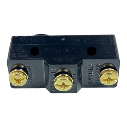 A black electrical contact block with three gold screw terminals and printed specifications on top, photographed on a plain white background.
