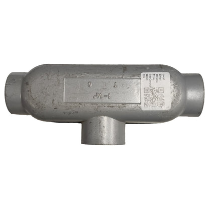 Metal T-fitting with labels on a white background