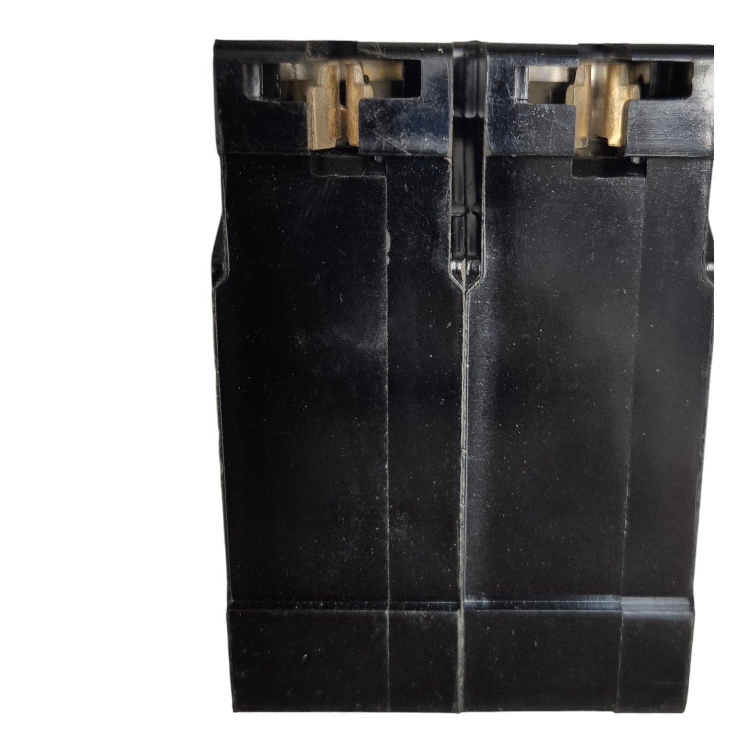 A black plastic dual-gauge magazine or grip insert with brass-colored metal contacts visible at the top, isolated on a white background.