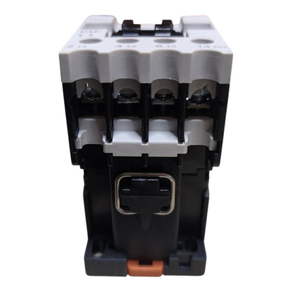 A 3-phase contactor relay with a black plastic body, gray terminal covers, and a small orange release tab at the bottom, shown against a plain white background.