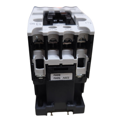 A three-phase contactor relay with a black plastic body and white terminal blocks, featuring a label that reads '220V 50Hz 60Hz'.