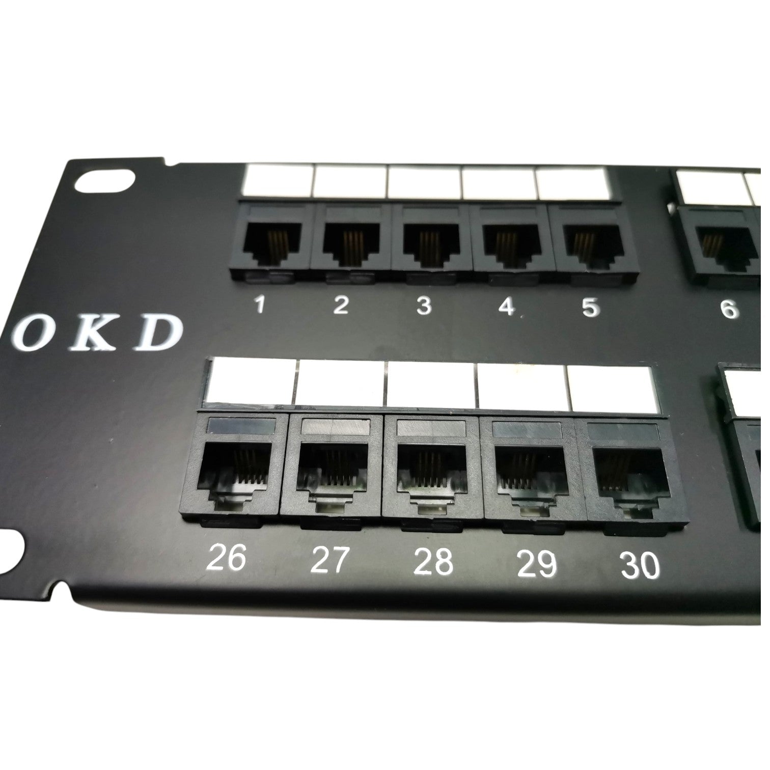 Black RJ45 patch panel with 10-port and 24-port modular network connectors, labeled with numbers 1 through 30 on a white background.
