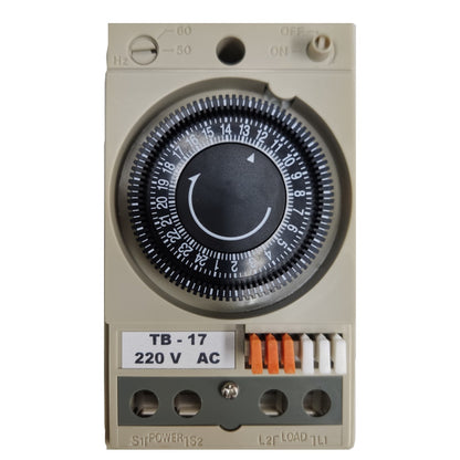 Mechanical timer with a dial on a beige background