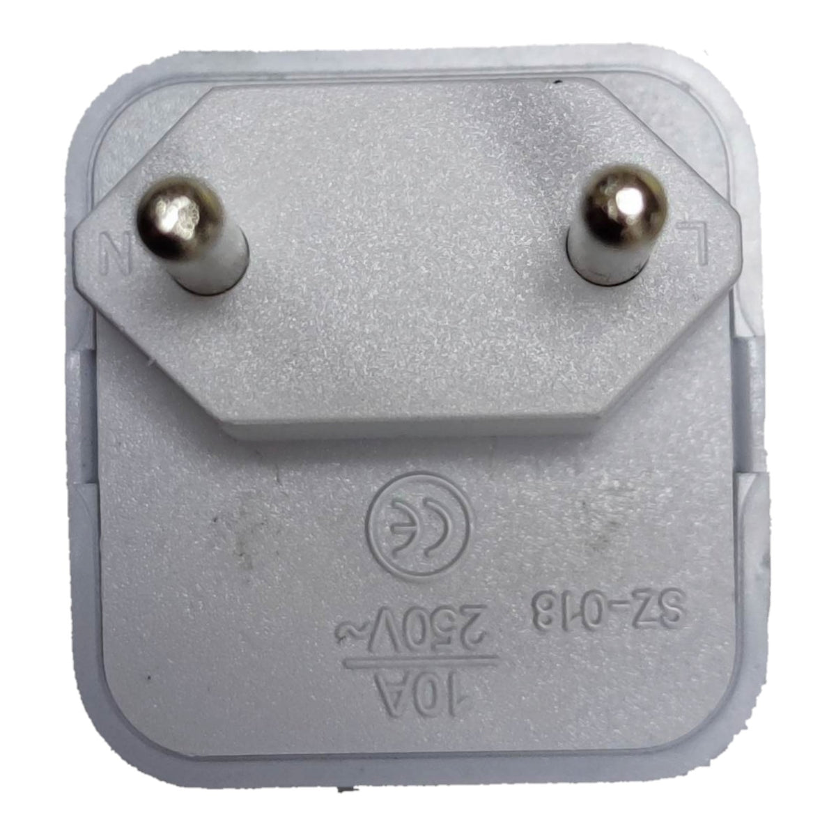 A close-up of a gray plastic electrical plug with two metallic pins, showing embossed specifications and a CE mark on a white background.