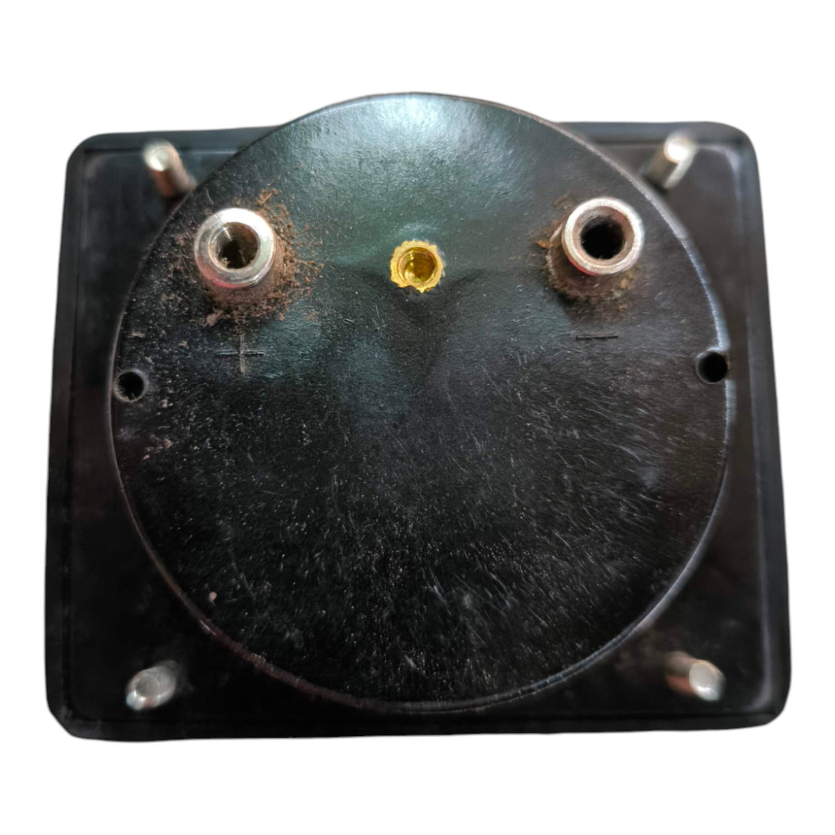 A black circular electronic component or motor terminal housing with a square mounting base, featuring two silver metal terminal posts on the left and right and a small gold center contact, shown against a plain white background.