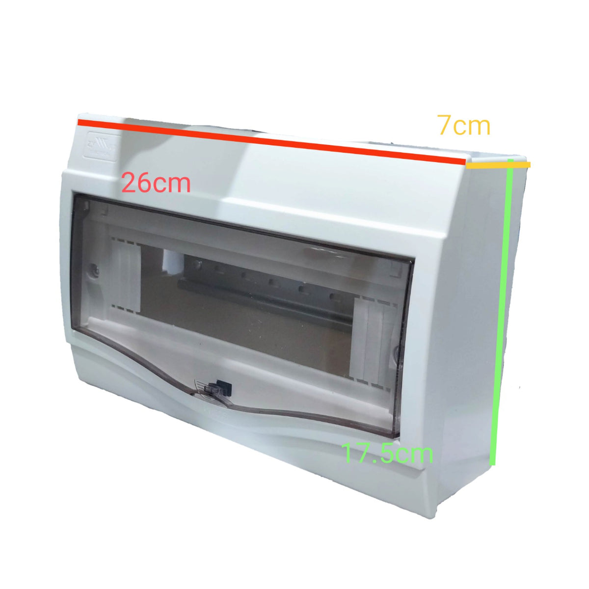 A white electrical distribution board enclosure with a transparent front door, showing internal compartments. Red, yellow, and green dimension lines with measurements '26cm', '7cm', and '17.