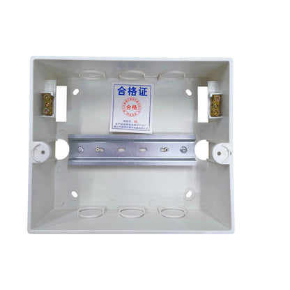 A white plastic electrical junction box shown from above on a white background, featuring brass screw terminals, a metal mounting rail, and a Chinese certification label in the center.